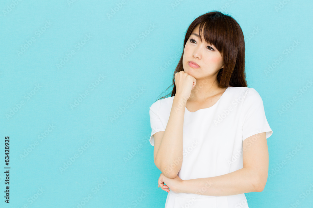 attractive asian nurse on blue background attractive asian nurse on blue background