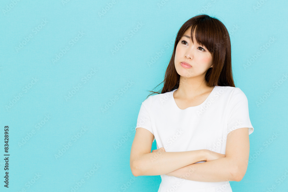 attractive asian nurse on blue background attractive asian nurse on blue background