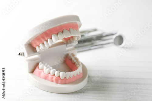 White teeth on table background