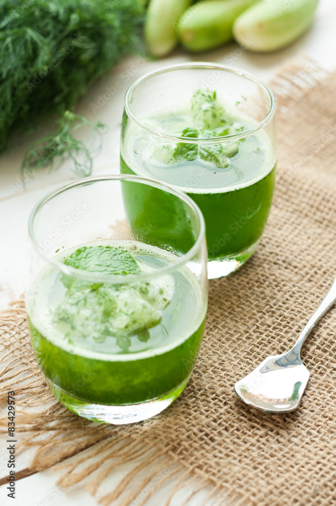 green smoothies on a brown background green smoothies on a brown background