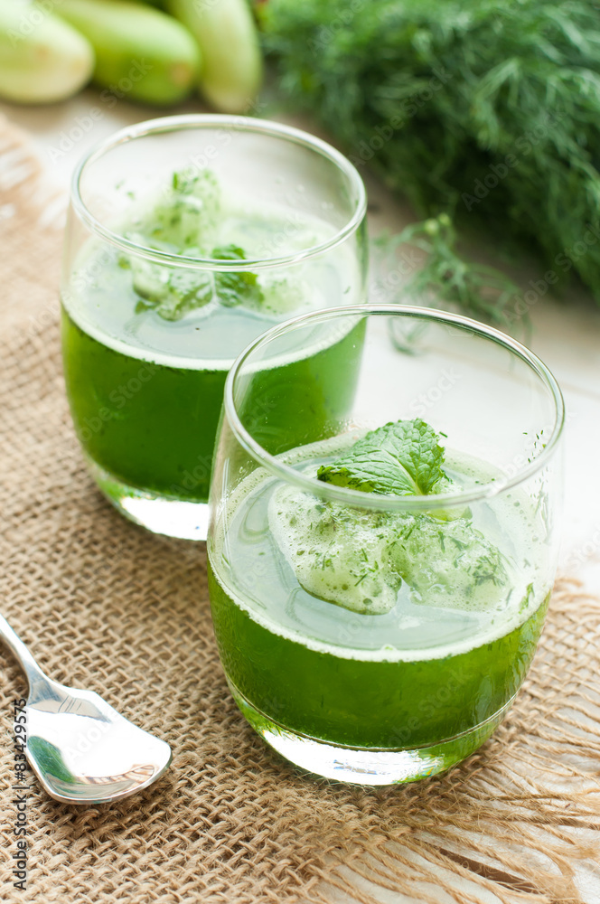 green smoothies on a brown background green smoothies on a brown background