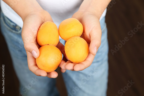 apricots in the hands