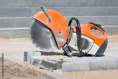 Concrete saw tool equipment at construction site © Fotolia RAW