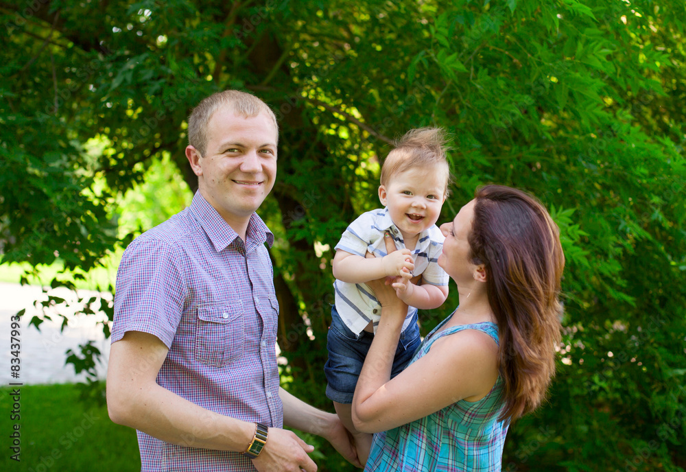 Naklejka premium Happy family outdoors