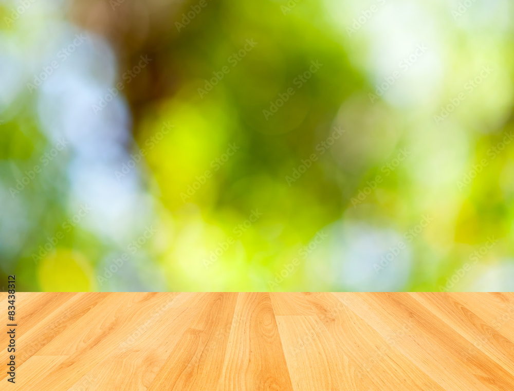 wood floor and green bokeh nature background wood floor and green bokeh nature background