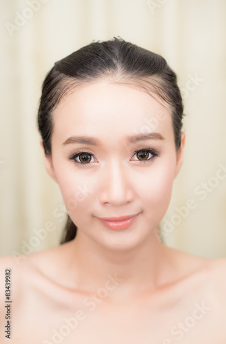 Beauty portrait of young woman with healthy skin on a face