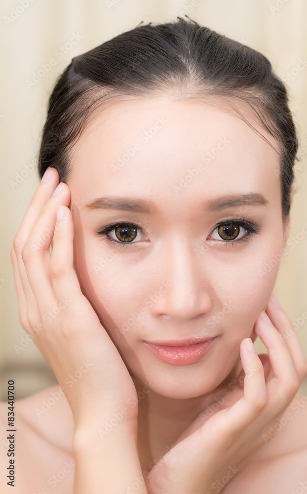 Beauty portrait of Asian woman with healthy skin on a face