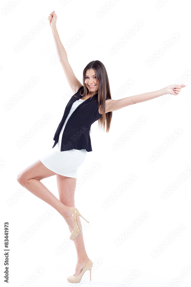Attractive young woman standing isolated on white Attractive young woman standing isolated on white