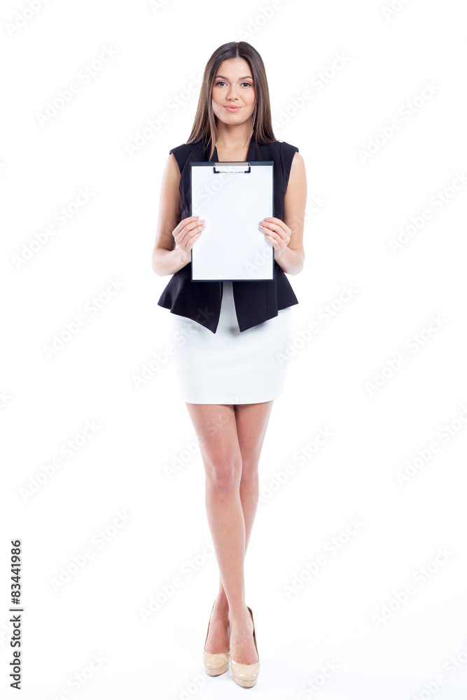 Attractive young woman standing isolated on white Attractive young woman standing isolated on white
