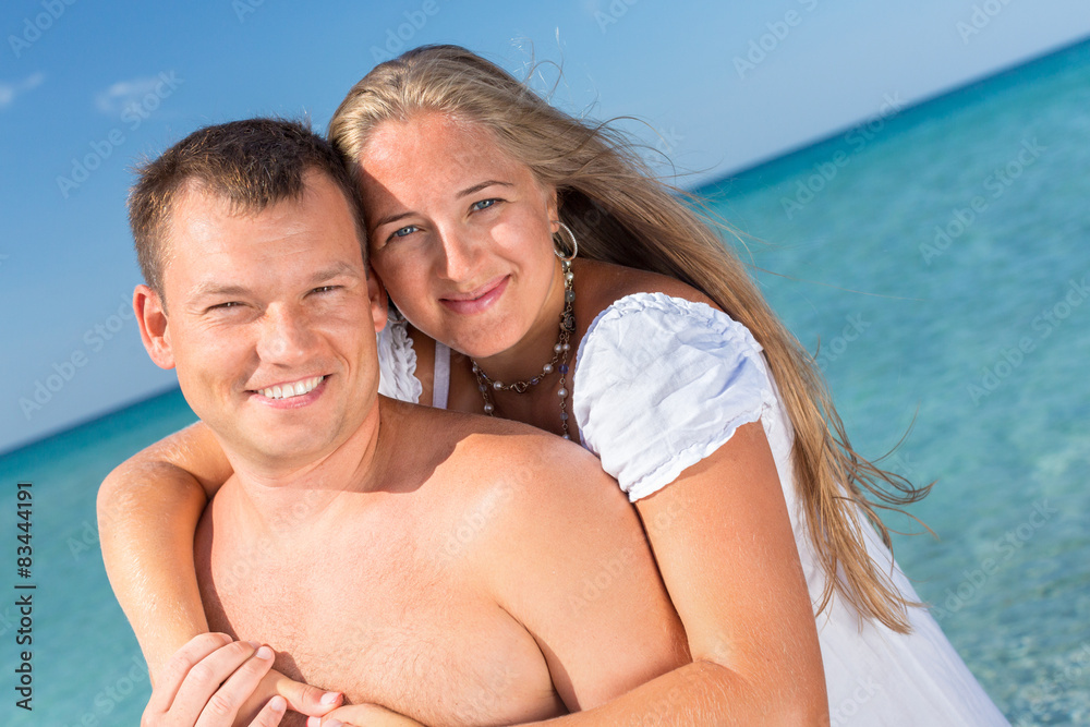 Happy couple on the beach