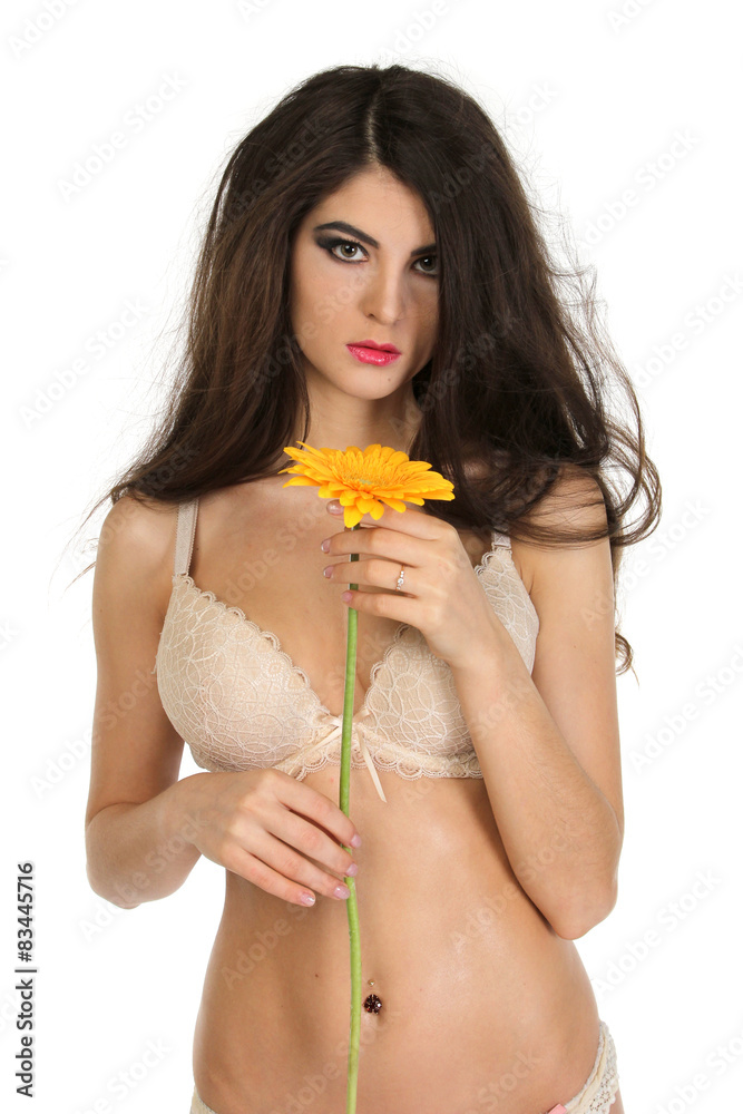 Beautiful young brunette woman with gerbera flower Beautiful young brunette woman with gerbera flower