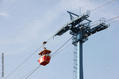 Cable car on blue sky background