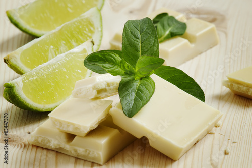 White chocolate with mint and lime, selective focus