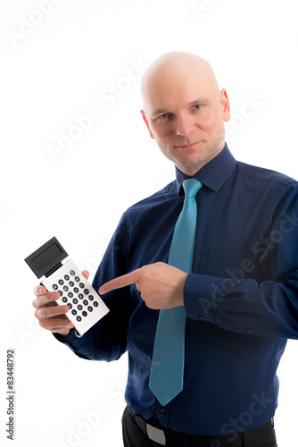 business man in blue shirt pointing to a pocket calculator