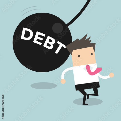 Businessman running away from huge pendulum with message 'debt'