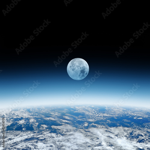 Earth with a Moon on a starless background.