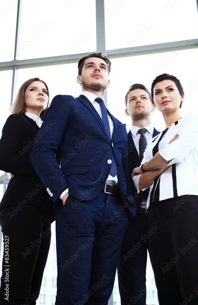 Happy smiling business team in office Happy smiling business team in office