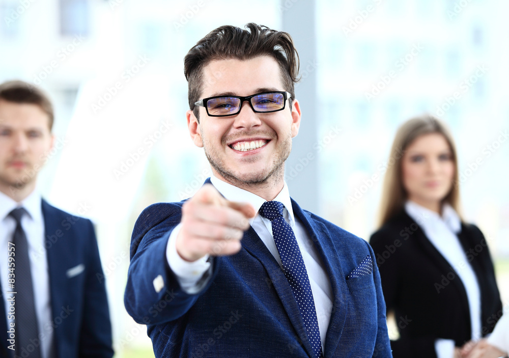 Handsome man pointing his finger at you Handsome man pointing his finger at you