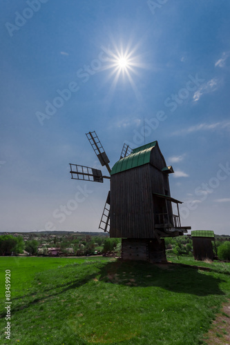 windmill under a sparkle sun