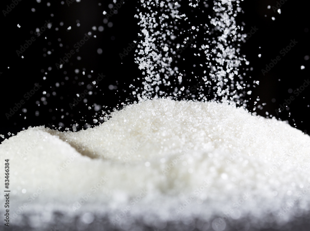 sugar on a black background sugar on a black background