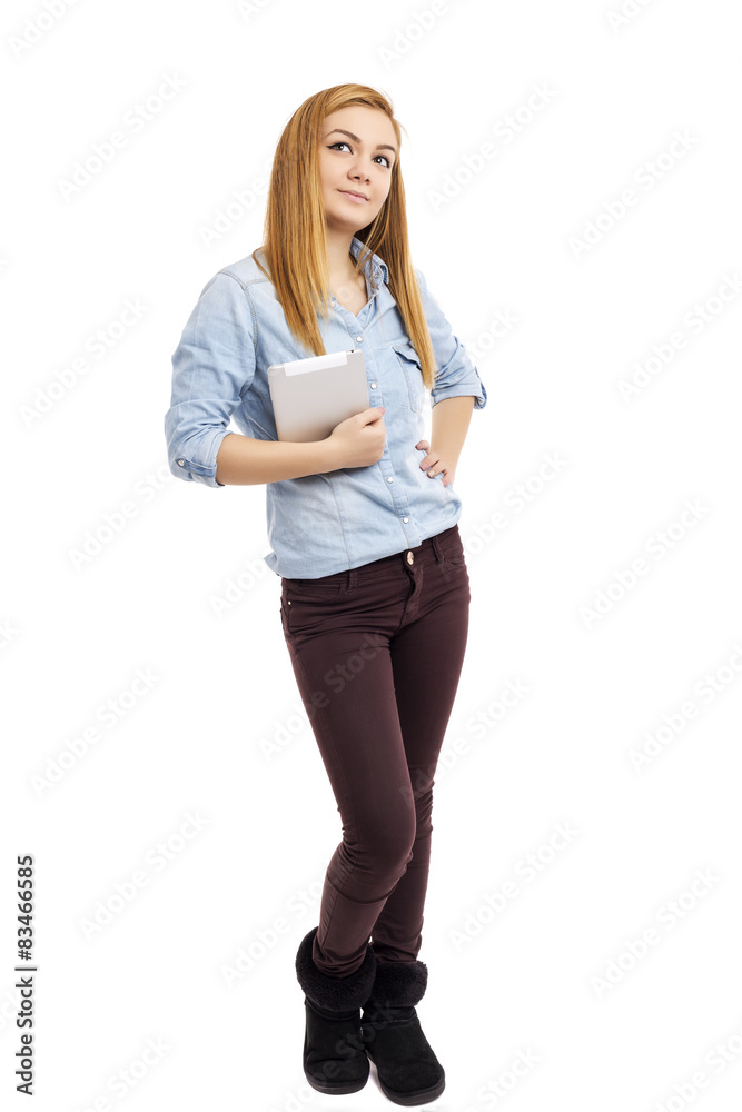 Portrait of a cute teenage girl holding a digital tablet Portrait of a cute teenage girl holding a digital tablet