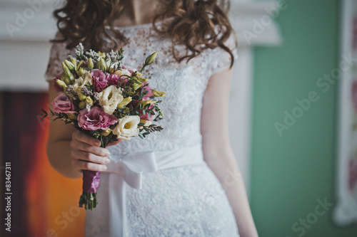 Bunch of flowers in hands of the bride 2647.