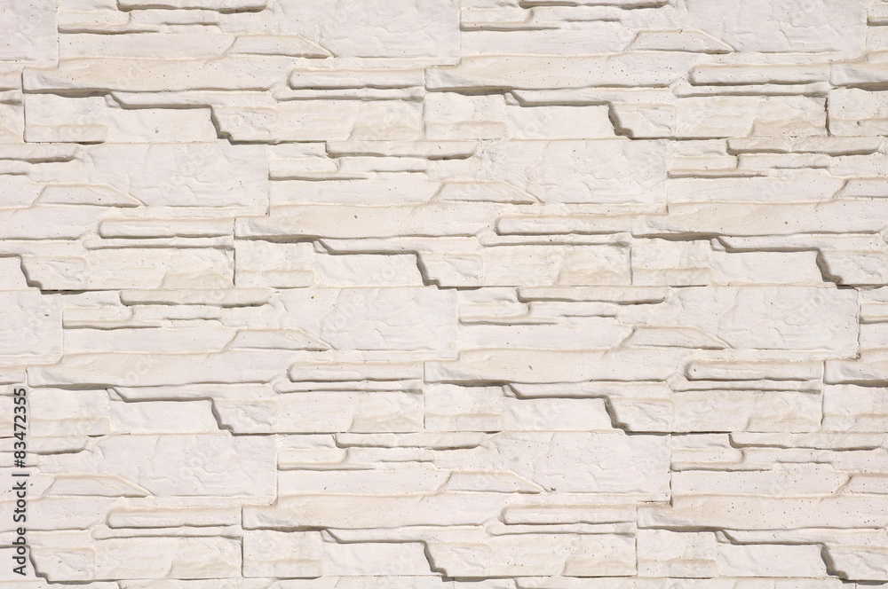 White cladding tiles imitating stones