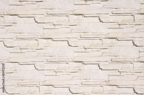 White cladding tiles imitating stones