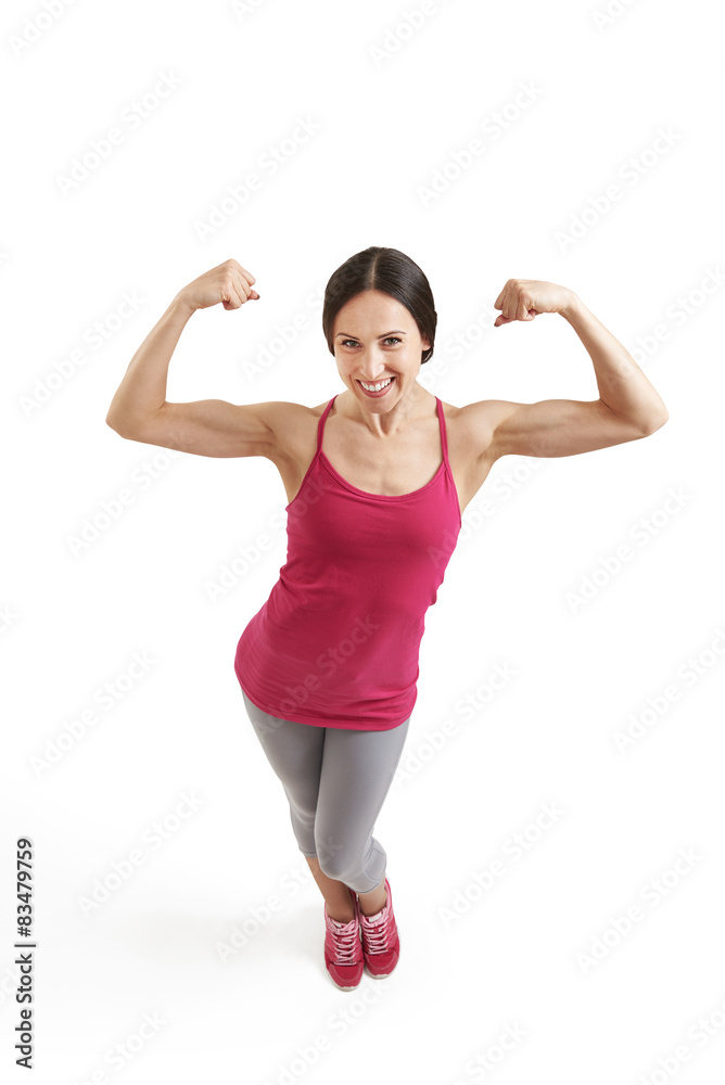 smiley woman showing her biceps smiley woman showing her biceps