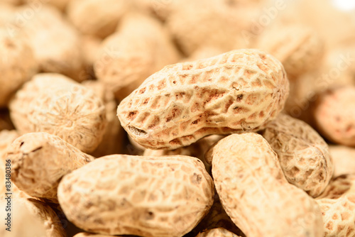 Peanuts on a wooden table.Selective focus