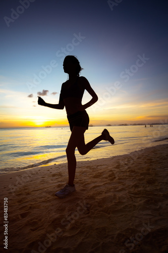 Silhouette of running woman