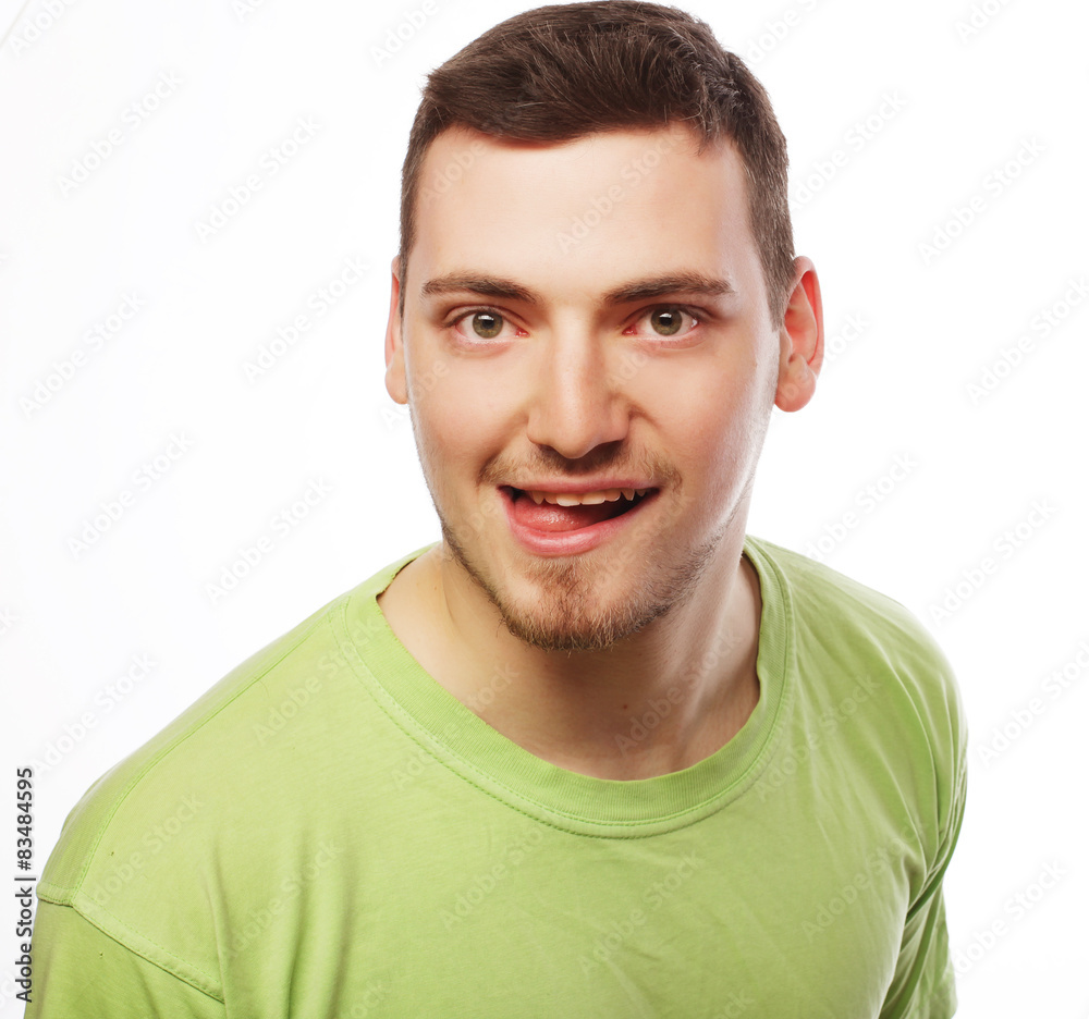 happy young man in green t-shirt happy young man in green t-shirt
