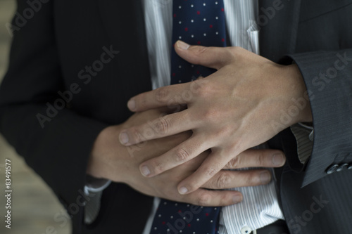 Businessman is sore stomach stress