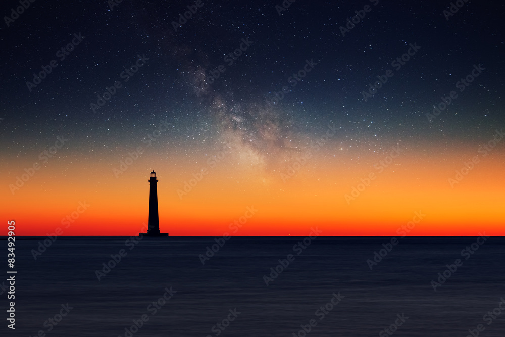 Lighthouse against night sky