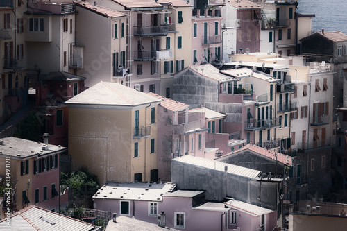 Retro style photo of houses on the hill