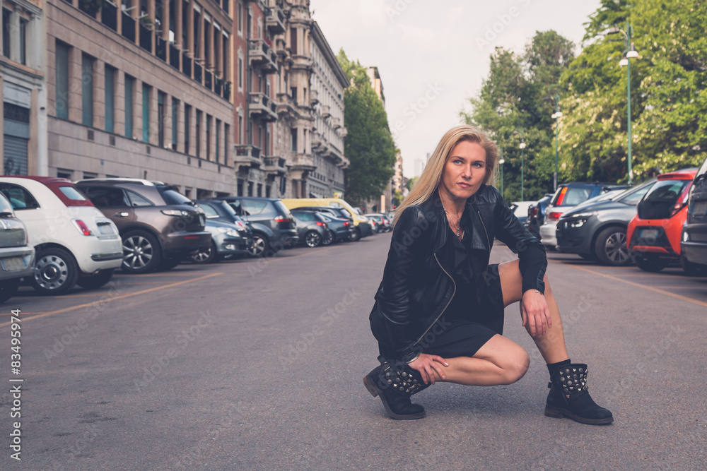 Beautiful girl posing in the city streets Beautiful girl posing in the city streets