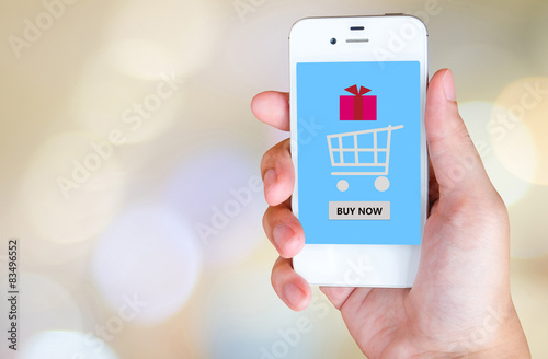 Buy now on smart phone screen in hand, e-business concept