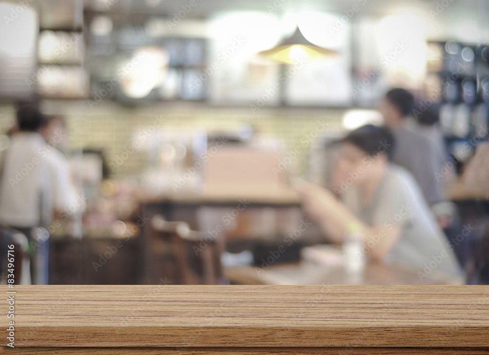 Empty wood table and blurred cafe with bokeh light background Empty wood table and blurred cafe with bokeh light background