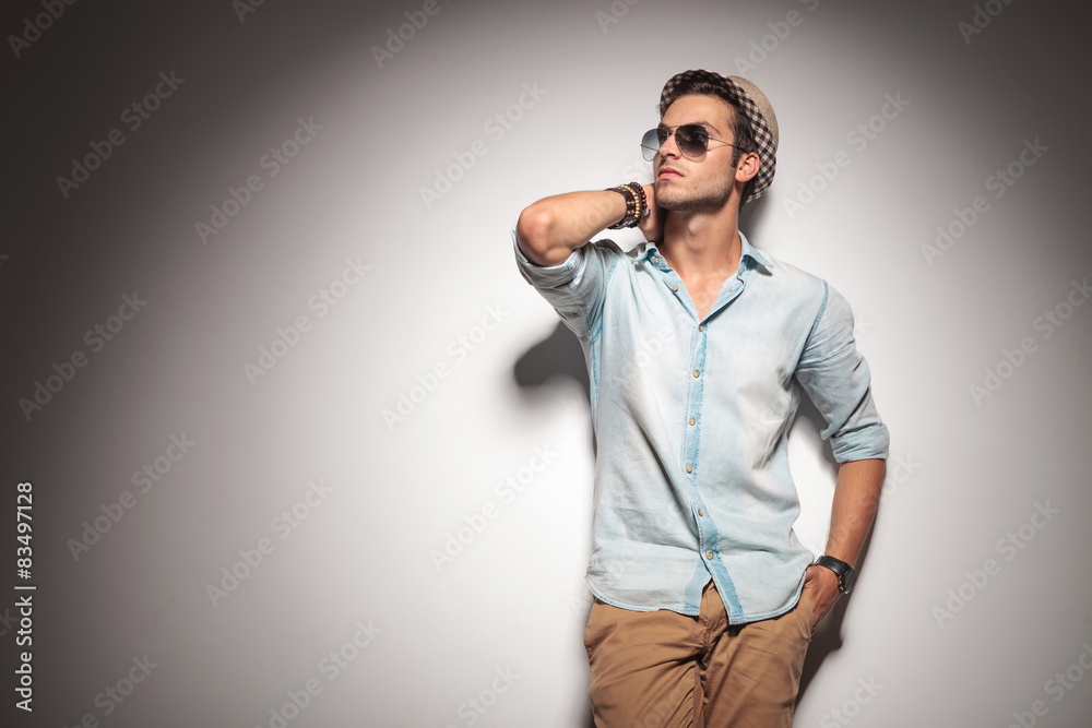  fashion man holding his hand to his neck