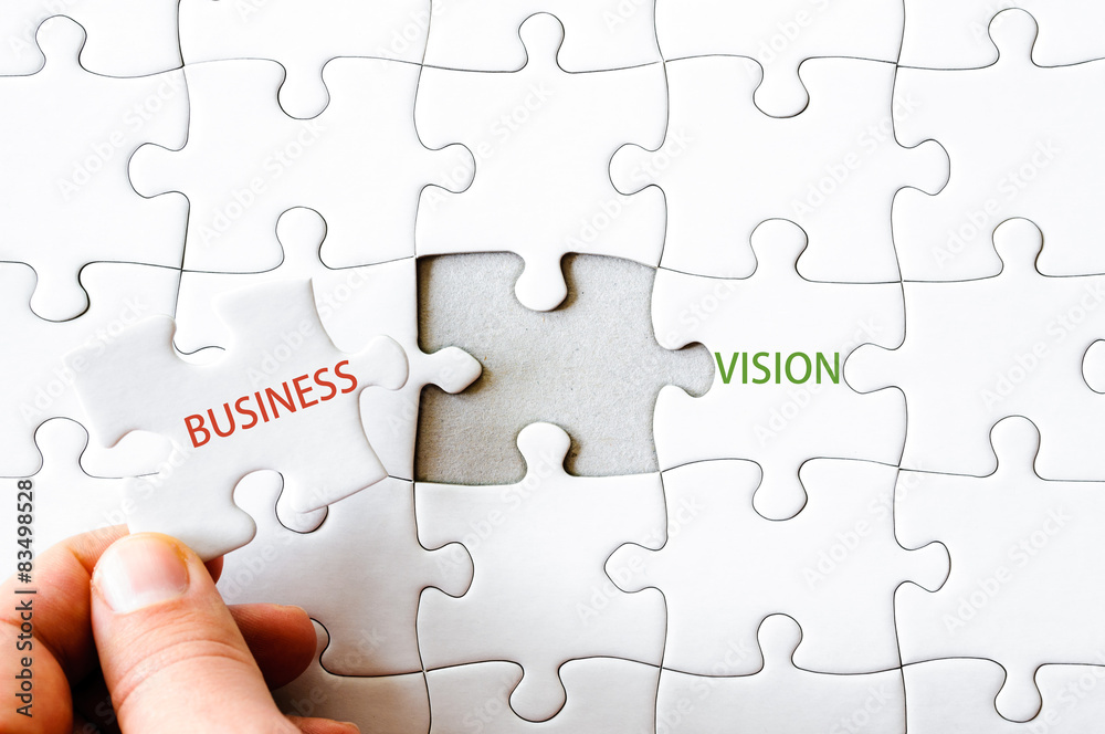 Puzzle piece completing words BUSINESS VISION Puzzle piece completing words BUSINESS VISION