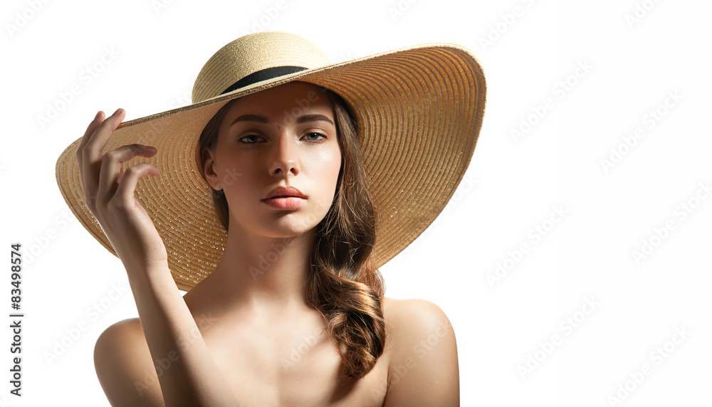 Young woman in summer straw hat on a white background isolated Young woman in summer straw hat on a white background isolated