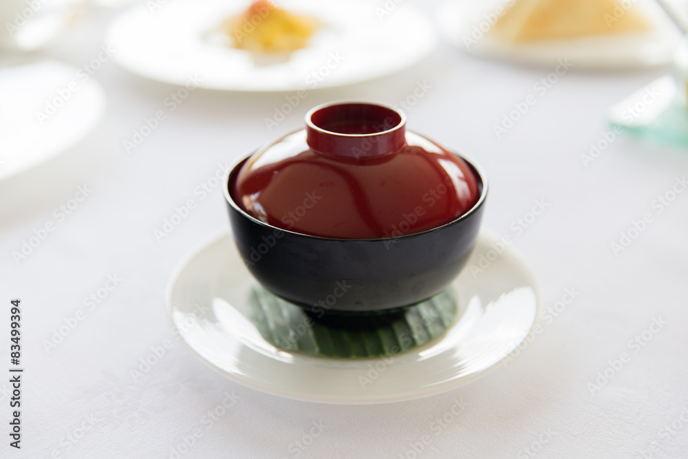 ceramic pot with hot dish on restaurant table ceramic pot with hot dish on restaurant table