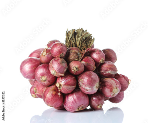 Shallot onions in a group on White