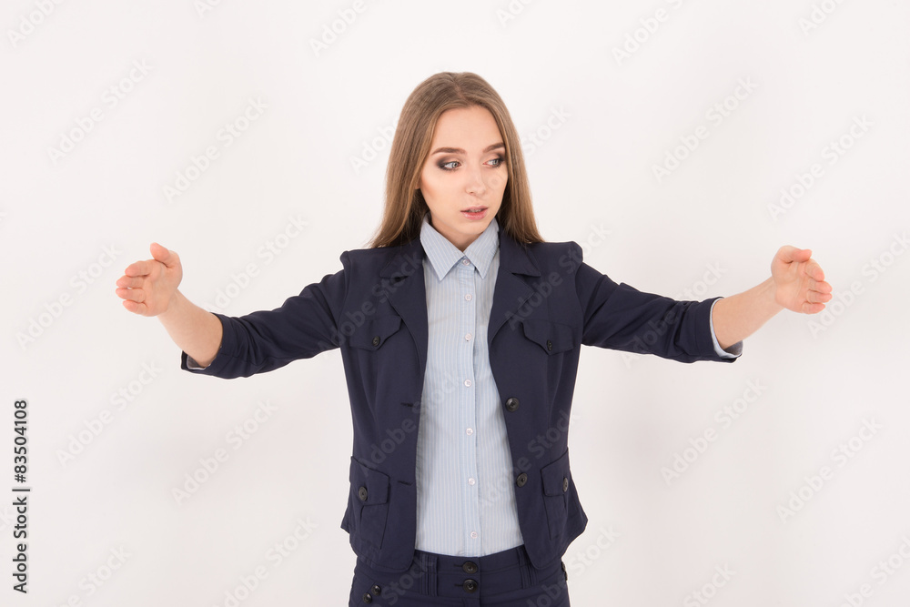 Businesswoman showing size. Beautiful young businesswoman in sui Businesswoman showing size. Beautiful young businesswoman in sui