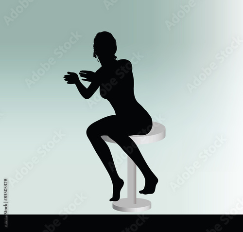 woman silhouette with sitting pose leaning on table