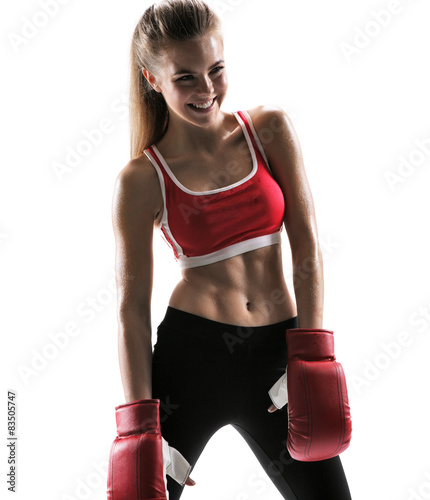 Cheerful sweaty Tae Bo instructor with boxing gloves 