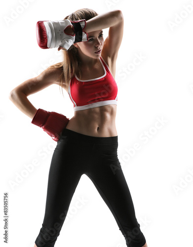  Tired brunette with boxing gloves having rest after workout © Romario Ien