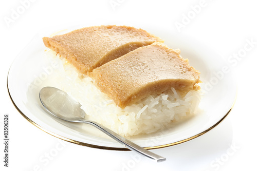 Thai custard with sticky rice on white