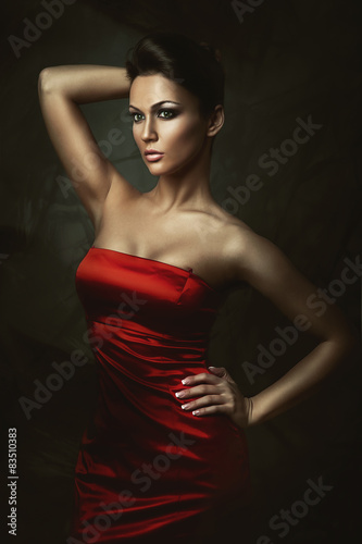 beautiful brunette woman in red dress