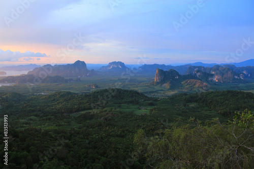 Sunrise over valley with mountains